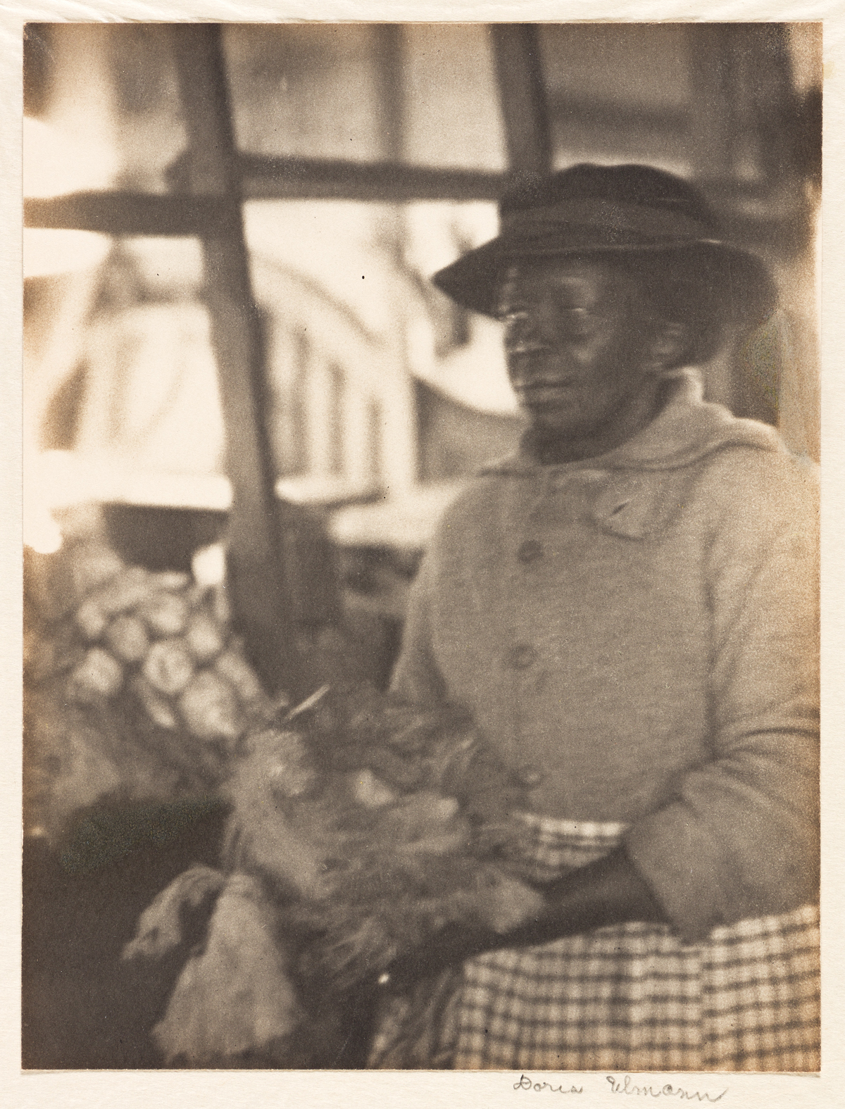 Ulmann, Doris (1882-1934) Woman at Vegetable Market.